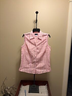 Basic Editions sleeveless button up blouse.